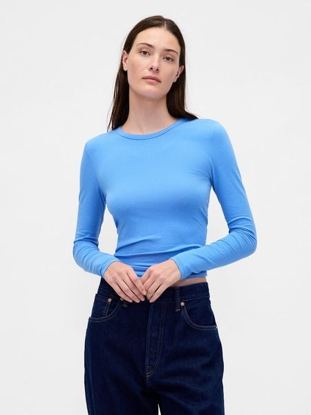 GAP Koszulka w kolorze niebieskim rozmiar: XS. Niebieskie bluzki GAP, xs, bez wzorów, z bawełny, bez kołnierzyka, bez ramiączek. Za 34.69 zł.