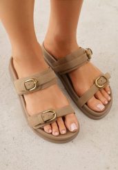 Ciemnobeżowe Klapki z Dwoma Paskami i Klamrami Cevinra. Brązowe klapki Born2be, bez wzorów, bez obcasa, na płaskiej podeszwie. Za 79.99 zł.