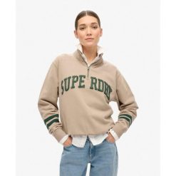 Bluza sportowa z pół-zipem. Niebieskie koszulki sportowe Superdry, bez wzorów, bez ramiączek, na fitness i siłownię. Za 275.50 zł.