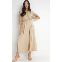 Beżowa Sukienka Kopertowa Chloriera. Brązowe sukienki Born2be, na imprezę, l, bez wzorów, z tkaniny, eleganckie, bez kołnierzyka, bez ramiączek, maxi, kopertowe. Za 149.99 zł.