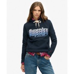 Kaptur Warstwowy. Niebieskie koszulki sportowe Superdry, bez wzorów, bez ramiączek. W wyprzedaży za 313.10 zł.