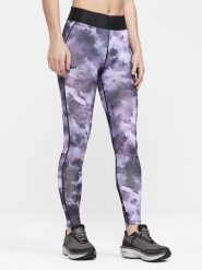 Craft Legginsy sportowe "Core Essence" w kolorze fioletowo-szarym rozmiar: M. Różowe legginsy Craft, m, bez wzorów, outdoorowe. Za 98.45 zł.