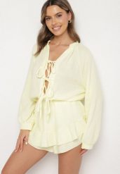 Żółty Wiązany Bawełniany Kombinezon Boho z Falbankami i Wiązaniem Lalelia. Żółte sukienki Born2be, na co dzień, na lato, uniwersalny, bez wzorów, z bawełny, boho, bez kołnierzyka, bez ramiączek, proste. Za 189.99 zł.