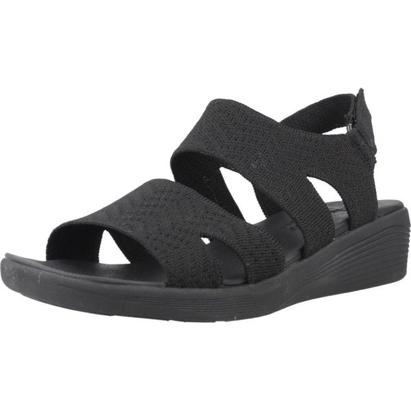 Sandały SKECHERS ARYA MODERN MUSE Czarny. Czarne sandały Skechers, bez wzorów, z tkaniny, bez obcasa, bez zapięcia. Za 174.99 zł.