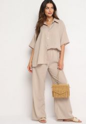 Ciemnobeżowy Komplet 2-Częściowy Koszula o Luźnym Kroju Szerokie Spodnie z Gumką w Talii Vimitha. Brązowe koszule Born2be, uniwersalny, z aplikacjami, z materiału, bez kołnierzyka, bez ramiączek. Za 149.99 zł.
