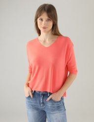 Czerwona bluzka z dzianiny. Czerwone bluzki Unisono, s, bez wzorów, z dzianiny, bez kołnierzyka, bez ramiączek. Za 139.00 zł.