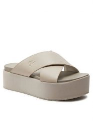 Calvin Klein Jeans Klapki Flatform Cross Mg Uc YW0YW01349 Beżowy. Brązowe klapki Calvin Klein Jeans, bez wzorów, z jeansu, bez obcasa. Za 259.99 zł.