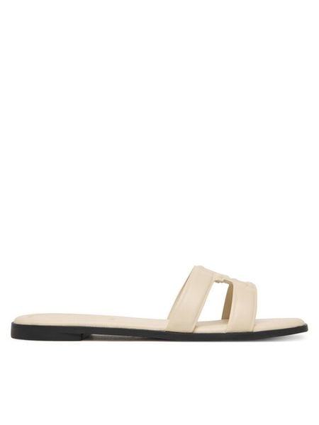 Tommy Hilfiger Klapki FW0FW08671 Écru. Klapki TOMMY HILFIGER, bez wzorów, ze skóry, bez obcasa. Za 449.99 zł.