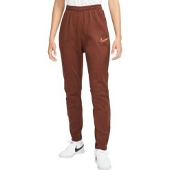 Spodnie Sportowe damskie Nike TF Academy Pant. Brązowe spodnie dresowe Nike, l, bez wzorów. Za 235.48 zł.