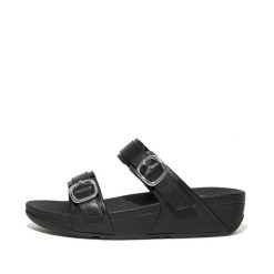 Kobiece klapki na koturnie FitFlop Lulu. Czarne klapki FIT FLOP, bez wzorów, z materiału, bez obcasa, na koturnie. Za 534.50 zł.