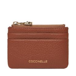 Bilonówka Coccinelle. Brązowe portfele Coccinelle, bez wzorów. Za 299.99 zł.