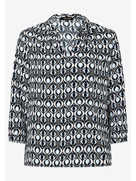 More & More Bluzka w kolorze błękitno-granatowo-białym rozmiar: 34. Białe bluzki More & More, s, bez wzorów, z wiskozy, klasyczne, bez kołnierzyka, bez ramiączek. Za 69.99 zł.