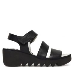 Sandały Fly London. Czarne sandały Fly London, bez wzorów, bez obcasa, na koturnie, bez zapięcia. Za 547.99 zł.