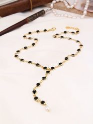 Pierres de Jade Pozłacany naszyjnik z elementami ozdobnymi - dł. 55 cm rozmiar: onesize. Czarne naszyjniki Pierres de Jade, z kryształem, pozłacane. Za 43.99 zł.