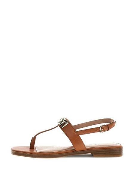 Guess Sandały FLJRMY LEA03 Brązowy. Brązowe sandały Guess, z aplikacjami, ze skóry, bez obcasa, na płaskiej podeszwie, bez zapięcia. Za 299.99 zł.