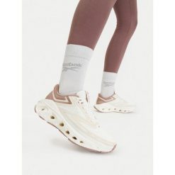 Buty do biegania Reebok. Białe obuwie sportowe Reebok, bez zapięcia, do biegania. Za 349.99 zł.