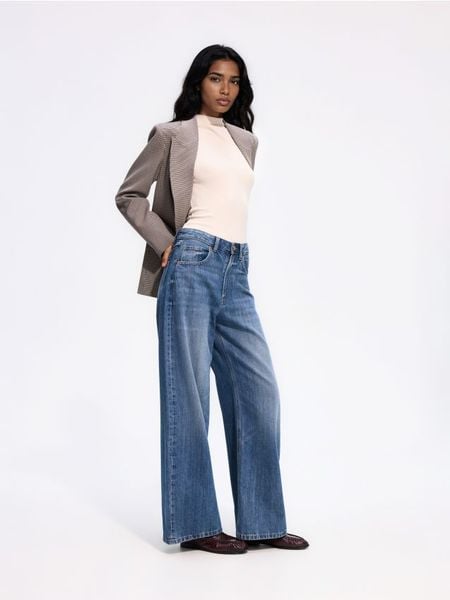 Jeansy wide leg z wysokim stanem - granatowy. Niebieskie jeansy Reserved, bez wzorów, z podwyższonym stanem. Za 139.99 zł.