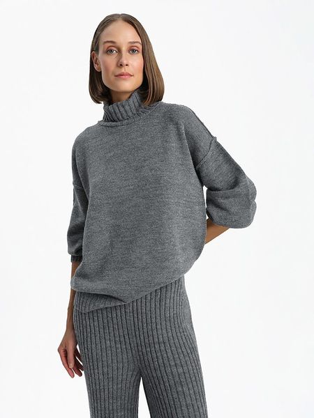 BGN Sweter w kolorze szarym rozmiar: 40. Szare swetry BGN, bez wzorów, ze splotem, bez ramiączek. Za 144.95 zł.