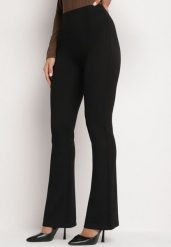 Czarne Spodnie z Bawełną i Wiskozą o Kroju Dzwonów z Wysokim Stanem i Gumką w Pasie Lertivra. Czarne spodnie materiałowe Born2be, do pracy, l, bez wzorów, z bawełny, z podwyższonym stanem. Za 79.99 zł.