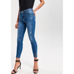 Jeansy slim fit - Niebieski. Jeansy Reserved. Za 119.99 zł.