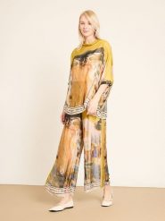 BGN Spodnie w kolorze żółtym rozmiar: 36. Żółte spodnie materiałowe BGN, na co dzień, bez wzorów, z materiału, z podwyższonym stanem. Za 195.99 zł.