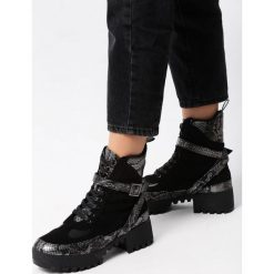 Czarne Botki Buddleja. Czarne botki Born2be, bez wzorów, ze skóry, przed kolano, bez obcasa, na płaskiej podeszwie, bez zapięcia. Za 159.99 zł.