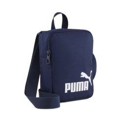 Torebka Puma Phase. Białe torby na ramię Puma, bez wzorów, z materiału, sportowe, na ramię, bez dodatków. Za 136.99 zł.