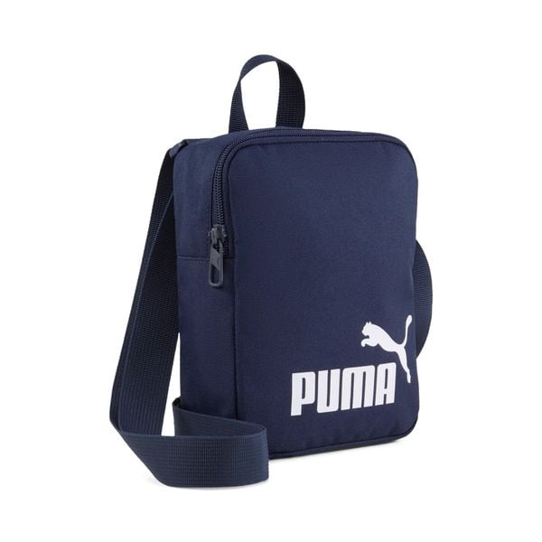 Torebka Puma Phase. Białe torby na ramię Puma, bez wzorów, z materiału, sportowe, na ramię, bez dodatków. Za 138.99 zł.