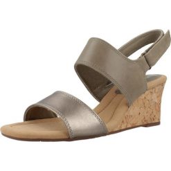 Sandały CLARKS KYARRA FAYE Zielony. Zielone sandały Clarks, bez wzorów, ze skóry, bez obcasa, bez zapięcia. Za 192.99 zł.