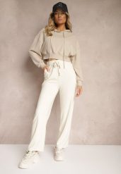 Jasnobeżowe Spodnie z Dodatkiem Wiskozy High Waist o Szerokim Kroju ze Sznurkami Isnia. Brązowe spodnie materiałowe Renee, na co dzień, l, bez wzorów, z jeansu, z podwyższonym stanem. W wyprzedaży za 38.49 zł.