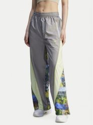 Adidas by Stella McCartney Spodnie dresowe Earth Collage JG5794 Szary Loose Fit. Szare spodnie dresowe adidas by Stella McCartney, m, bez wzorów, z dresówki. Za 479.99 zł.