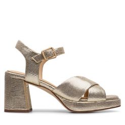 Sandały Clarks. Żółte sandały Clarks, bez wzorów, bez obcasa, na słupku, bez zapięcia. Za 459.99 zł.