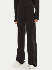 Guess Spodnie dresowe O4BB02 KCHZ2 Czarny Relaxed Fit. Czarne spodnie sportowe Guess, m, z aplikacjami, z bawełny. Za 229.99 zł.