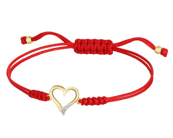 Bransoletka z elementami żółtego złota i diamentem - serce - 0,002 ct - próba 375. Żółte bransoletki Apart, z diamentem, złote. Za 729.00 zł.