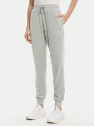 Guess Spodnie dresowe V3BB27 K0232 Zielony Regular Fit. Zielone spodnie dresowe Guess, m, z aplikacjami, z dresówki. Za 329.99 zł.