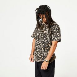 Koszulka do tańca Starever oversize. Brązowe bluzki STAREVER, xl, bez wzorów, z bawełny, sportowe, bez kołnierzyka, bez ramiączek. W wyprzedaży za 29.99 zł.