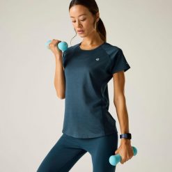 Damska koszulka z krótkim rękawem i okrągłym dekoltem Corral Active. Niebieskie bluzki Dare 2b, bez wzorów, z elastanu, sportowe, bez kołnierzyka, bez ramiączek. Za 111.00 zł.