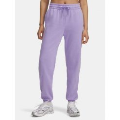 Spodnie dresowe damskie Under Armour Rival Terry Jogger. Fioletowe spodnie dresowe Under Armour, bez wzorów, z dresówki, na fitness i siłownię. Za 199.99 zł.