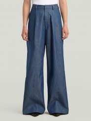 G-Star Spodnie w kolorze granatowym rozmiar: W28. Niebieskie spodnie materiałowe G-Star, bez wzorów, z materiału, z podwyższonym stanem. Za 297.97 zł.