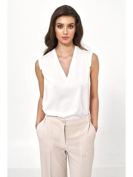 Nife Bluzka w kolorze kremowym rozmiar: 42. Brązowe bluzki Nife, bez wzorów, z wiskozy, bez kołnierzyka, bez ramiączek. Za 113.90 zł.