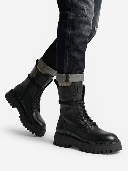 G-Star Raw Trzewiki EO-GEDIZ-8090-25 Czarny. Czarne botki G-Star, bez wzorów, ze skóry, bez obcasa, na płaskiej podeszwie, bez zapięcia. Za 479.99 zł.