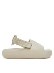 Adidas Sandały adilette IG8429 Beżowy. Brązowe sandały Adidas, bez wzorów, z tworzywa sztucznego, bez obcasa, na płaskiej podeszwie, bez zapięcia. Za 209.99 zł.