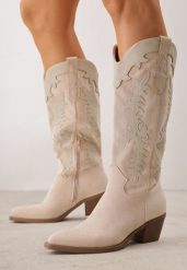 Beżowe Kozaki Kowbojki na Stożku z Ozdobnymi Przeszyciami w Stylu Western Nulia. Brązowe kozaki Renee, z jeansu, bez obcasa, na obcasie, bez zapięcia. Za 199.99 zł.