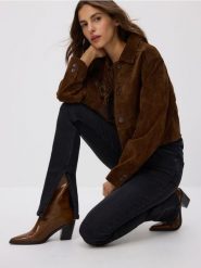 Jeansy slim fit z rozcięciem - czarny. Czarne jeansy Reserved, bez wzorów. Za 139.99 zł.
