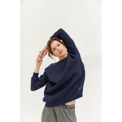 Bluza do jogi Moonholi Cozy AF Oversize Sweatshirt z bawełnianej dzianiny. Niebieskie bluzy MOONHOLI, s, bez wzorów, z bawełny, bez kaptura. Za 329.00 zł.