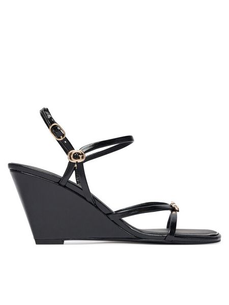 Guess Sandały FLTDVV PAF04 Czarny. Czarne sandały Guess, z aplikacjami, ze skóry, bez obcasa, na koturnie, bez zapięcia. Za 494.99 zł.