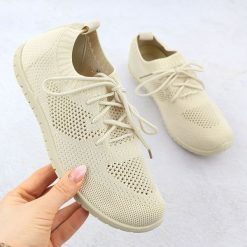 Buty sportowe damskie ażurowe beżowe News 1020. Brązowe obuwie sportowe NEWS, z tkaniny, bez zapięcia. Za 109.99 zł.
