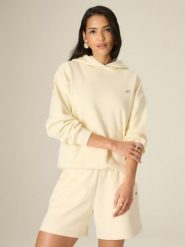 4F Bluza dresowa loose z kapturem damska - żółta M. Żółte bluzy sportowe 4f, m, bez wzorów, z dresówki, z kapturem. Za 159.99 zł.