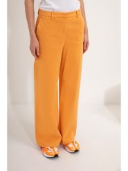 Josephine & Co Spodnie "Moos" w kolorze pomarańczowym rozmiar: 34. Pomarańczowe spodnie materiałowe Josephine & Co, bez wzorów, z materiału. Za 254.95 zł.