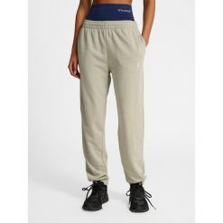 Damskie spodnie dresowe Hummel Pulse. Szare spodnie dresowe Hummel, bez wzorów, z dresówki, na fitness i siłownię. Za 137.00 zł.